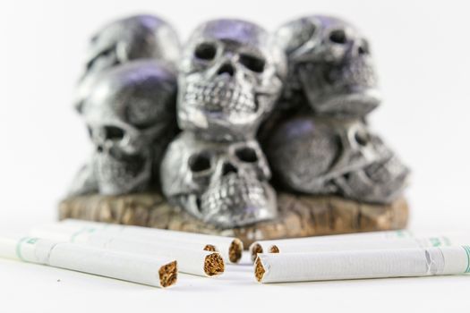 Anti smoking concept with cigarettes and skull