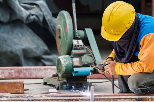 Steel Workers welding, grinding, cutting in metal industry