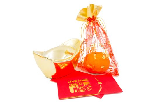 concept image of the chinese new year - Gold Ingot ,red packet and mandarin orange in the red auspicious bag