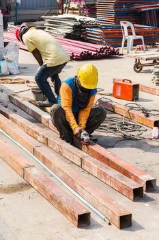 Steel Workers welding, grinding, cutting in metal industry