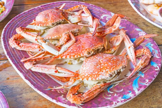 steamed cooked crabs on a plate