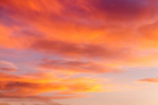 Dramatic sunrise sky with clouds.Blur or Defocus image.