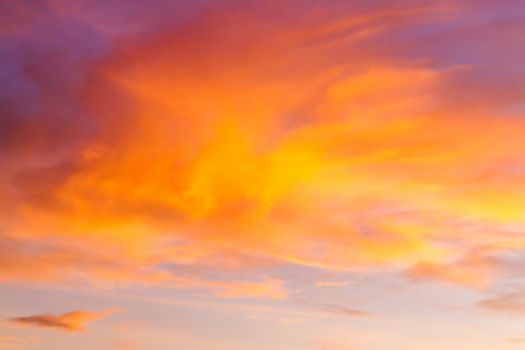 Dramatic sunrise sky with clouds.Blur or Defocus image.