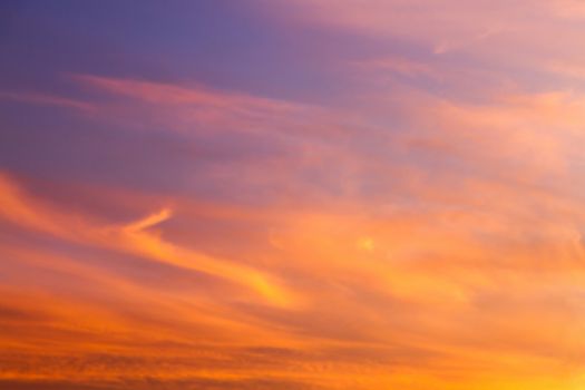 Dramatic sunrise sky with clouds.Blur or Defocus image.