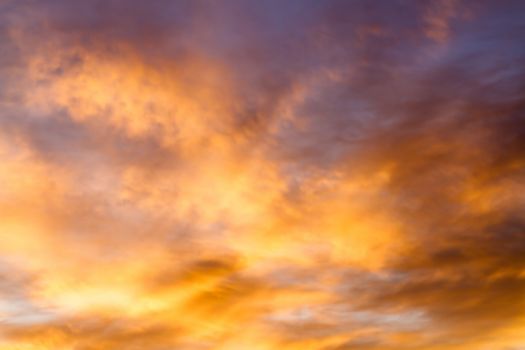 Dramatic sunrise sky with clouds.Blur or Defocus image.