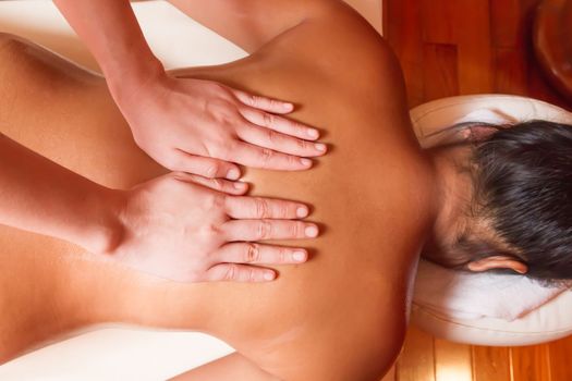 woman getting a massage at a health and beauty spa