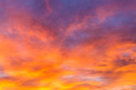 Dramatic sunrise sky with clouds.Blur or Defocus image.