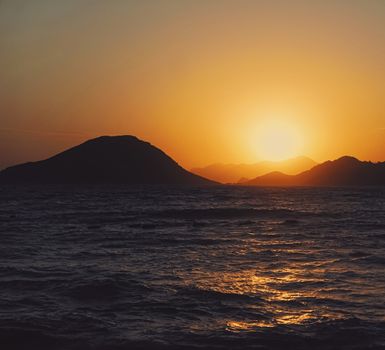 Beautiful sea view and mountains in the Mediterranean at sunset, summer vacation travel and holiday destination