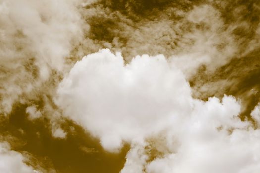 Heart shaped clouds in the sky, Valentine Background Gold color themes sweet shaped clouds of Heart