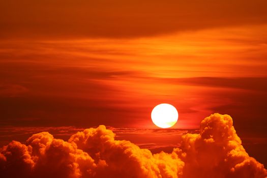 sunset back on silhouette colorful heap cloud on red sky