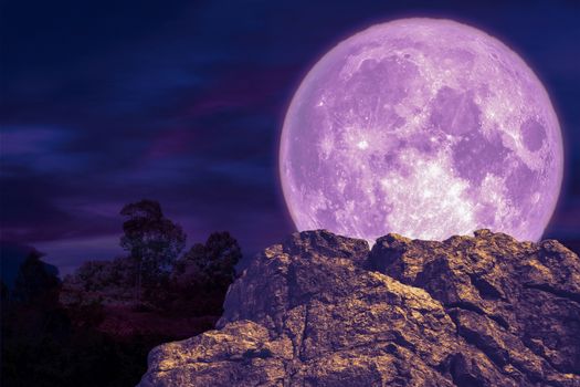 blood moon back over stone and rock of cliff, Elements of this image furnished by NASA