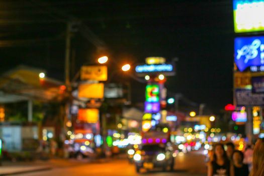 blurred colorful light image of china town restuarest and shopping mall local market in pattya city