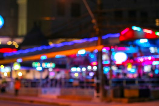 blur colorful of nightlight at night market in pattaya city