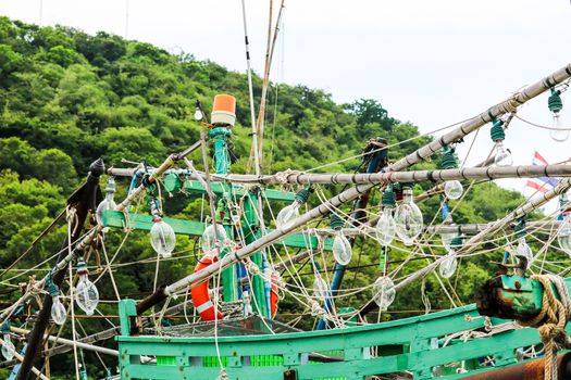 Spotlights was hanging on a fishing boat and squid fishing to catch the fish in the night