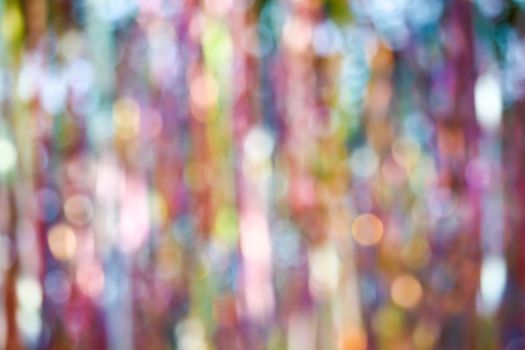 abstract blur of colorful ribbon rainbow on ceiling background