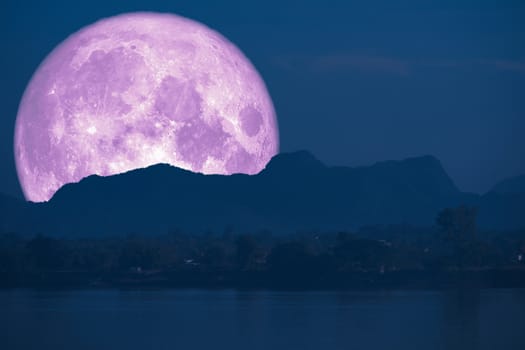 super full fish moon back on cloud and mountain on night sky, Elements of this image furnished by NASA