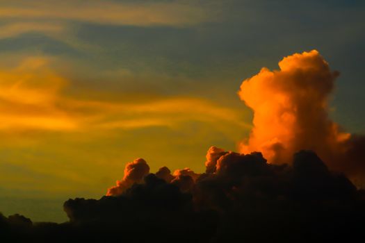 sunset silhouette orange cloud sunshine in dark sky soft cloud background