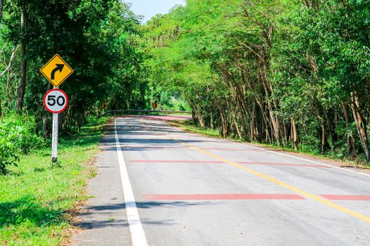 A dangerous curve on a roadway in which drivers cannot see approaching traffic and must drive slowly