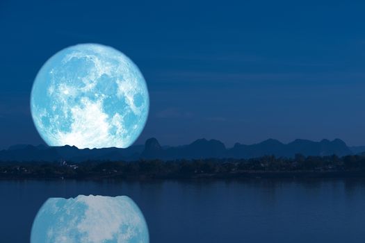 full milk moon back on silhouette mountain and reflection on river night sky, Elements of this image furnished by NASA