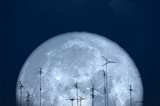 full milk moon back on silhouette antennas on night sky, Elements of this image furnished by NASA