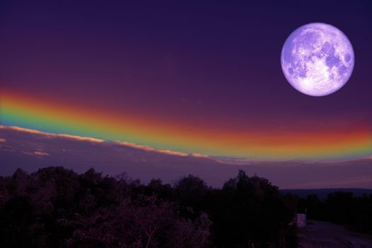 full milk blood moon silhouette hill and rainbow on night sky, Elements of this image furnished by NASA