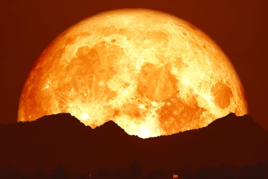blood moon on night red sky back over silhouette mountain, Elements of this image furnished by NASA