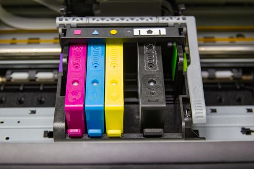 An ink cartridge or inkjet cartridge is a component of an inkjet printer that contains the ink four color