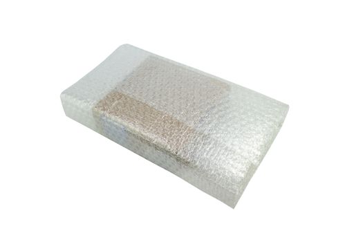 Bubbles covering the box by bubble wrap for protection product cracked white background