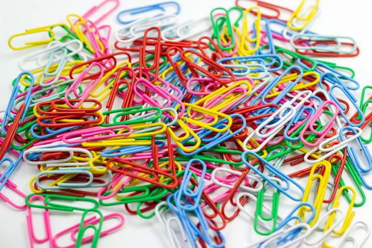 Collection of colorful Paper clips on white background


