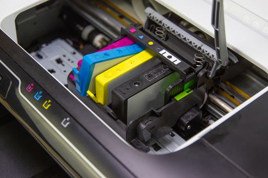 An ink cartridge or inkjet cartridge is a component of an inkjet printer that contains the ink four color