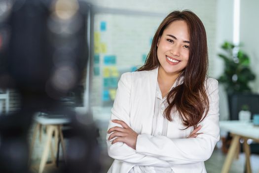 Portrait of Asian Business woman with thumbs up like when recording video for social influence at modern workplace,
human resource and small business owner, vlogging and social network concept