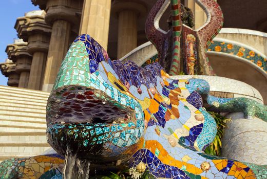 Lizard tile-shard front view Barcelona Parc Guell Gaudí mosaic dragon Fountain terrace pillars Catalonia Spain