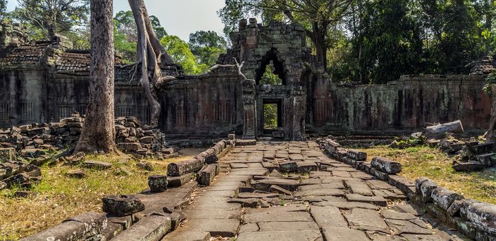 Ancient temple old ruin stone wall of Angkor wat Lost Khmer city in the jungle Siem Reap UNESCO World Heritage Site Cambodia.