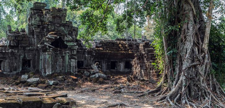 Ancient temple old ruin stone wall of Angkor wat Lost Khmer city in the jungle Siem Reap UNESCO World Heritage Site Cambodia.