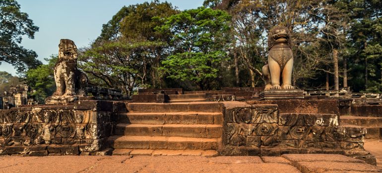 Ancient temple old ruin stone wall of Angkor wat Lost Khmer city in the jungle Siem Reap UNESCO World Heritage Site Cambodia.