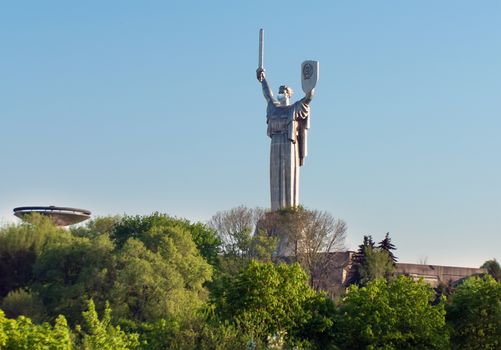 Quarantine Kiev Ukraine. Medical respiratory mask in Mother Motherland monument - part of Museum of the Great Patriotic War.