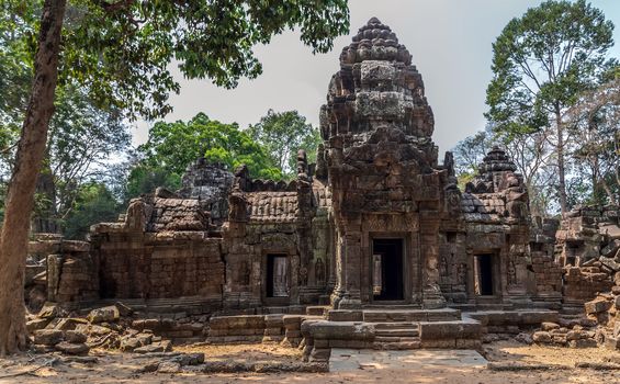Low relief carving decorative sanctuary sculpted elements Ancient bas-relief decorated temple old ruin stone wall of Angkor wat complex Siem Reap UNESCO World Heritage Site Cambodia.