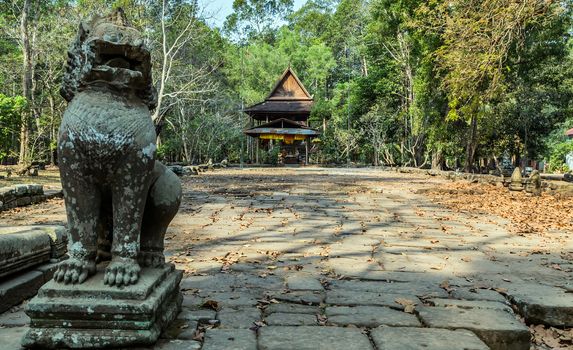 Ancient temple old ruin stone wall of Angkor wat Lost Khmer city in the jungle Siem Reap UNESCO World Heritage Site Cambodia.