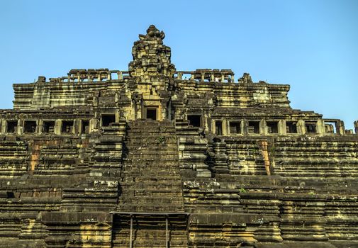 Ancient temple old ruin stone wall of Angkor wat Lost Khmer city in the jungle Siem Reap UNESCO World Heritage Site Cambodia.