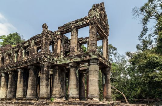 Ancient temple old ruin stone wall of Angkor wat Lost Khmer city in the jungle Siem Reap UNESCO World Heritage Site Cambodia.