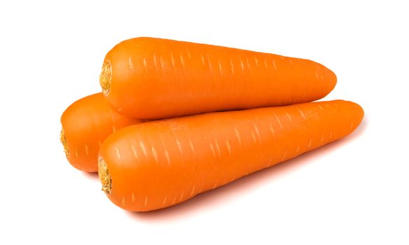 Fresh carrots isolated on white background. Close up of carrots.