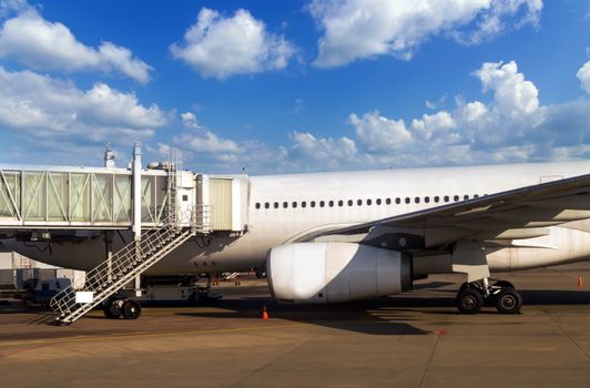airport airplane passenger terminal boarding plane