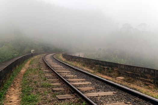 Railroad Tracks in the Fog Sri Lanka is a famous landmark. Sri Lanka Railway.