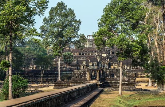Ancient temple old ruin stone wall of Angkor wat Lost Khmer city in the jungle Siem Reap UNESCO World Heritage Site Cambodia.