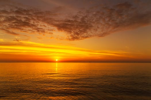 Colorful Ocean Sea water morning sky Sunset light beautiful clouds background