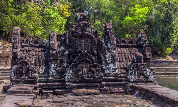 Jayatataka Baray pond Neak Pean artificial island to the Angkor temple complex Lost ancient Khmer Empire city in the jungle in Siem Reap Cambodia.