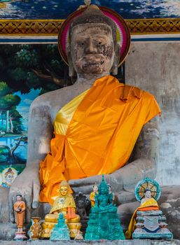 Buddha statue Robe orange cloth of Buddhist in Temple Angkor Wat, Siem Reap, Cambodia.