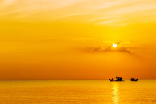 Fishing Boat seascape clouds over the water. fishing boat in the sea