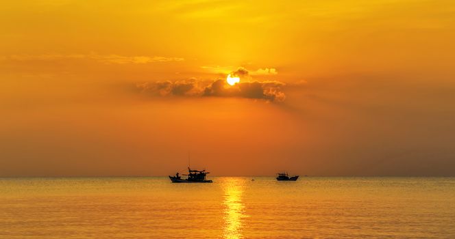 Landscape Sunset sunrise in the sea. Fishing Boat