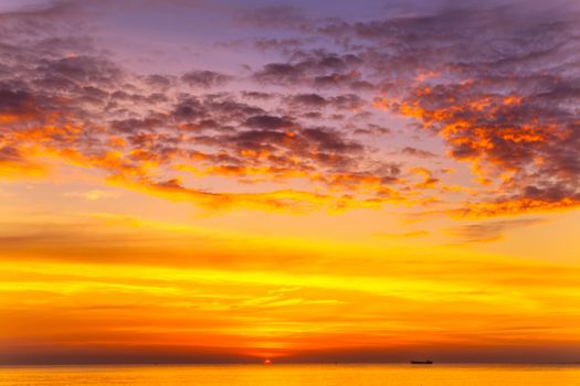 Sunset Gold sea background. Sunset sea waves morning sky. Summer sunset.